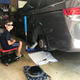 Just a cool guy doing cool guy things. He managed to stay interested for the full 90 minutes on both sides of the car. Pool noodle wrapped over jack handle to prevent dents. The car is actually on a jackstand, with the jack as backup.